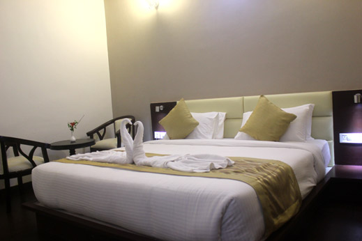 Corbett Tusker Trail Resort - Country View Room Bed